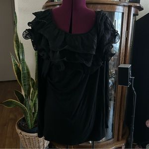 Stera Black Long Sleeve Top With Black Lace and Ruffles Around The Neckline.